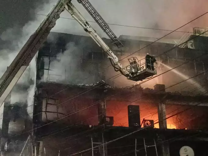 Fire breaks out in CCTV camera warehouse in three storey building 27 dead 12 serious 4